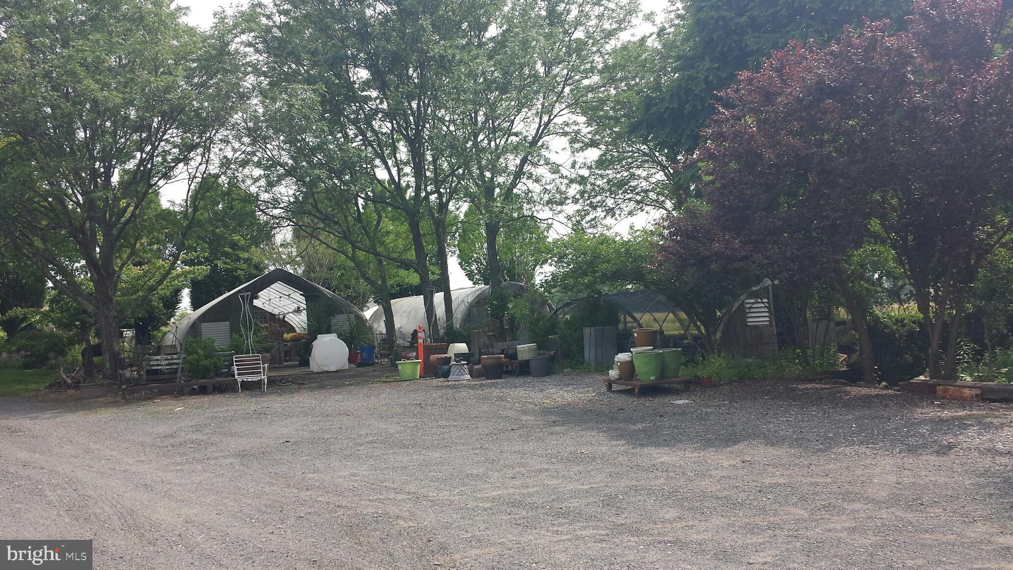 545 Weston Canal Road Somerset, NJ 08873 - Photo 7 of 41 a view of outdoor space with wooden deck and trees