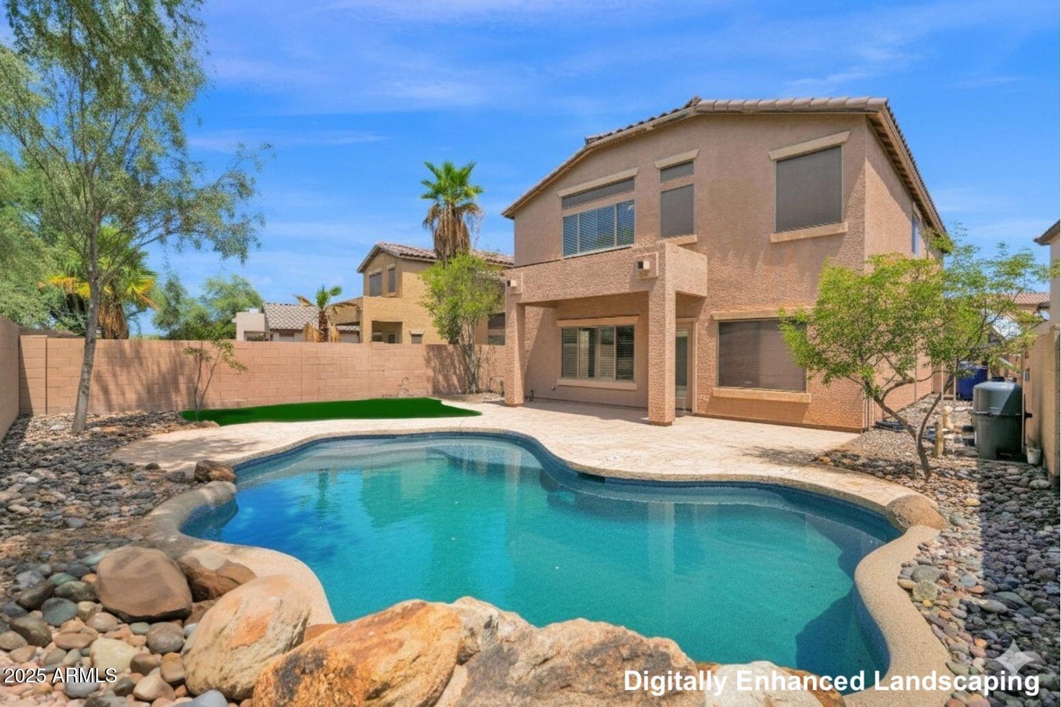 4294 South Woodshed Road Gilbert, AZ 85297 - Photo 1 of 2 a view of a house with pool and chairs