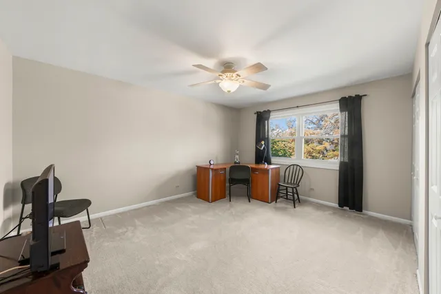 a view of workspace with lounge chair