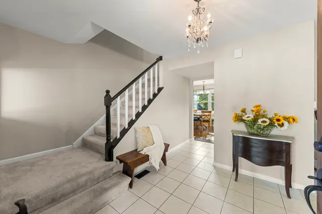 a view of entryway with wooden floor
