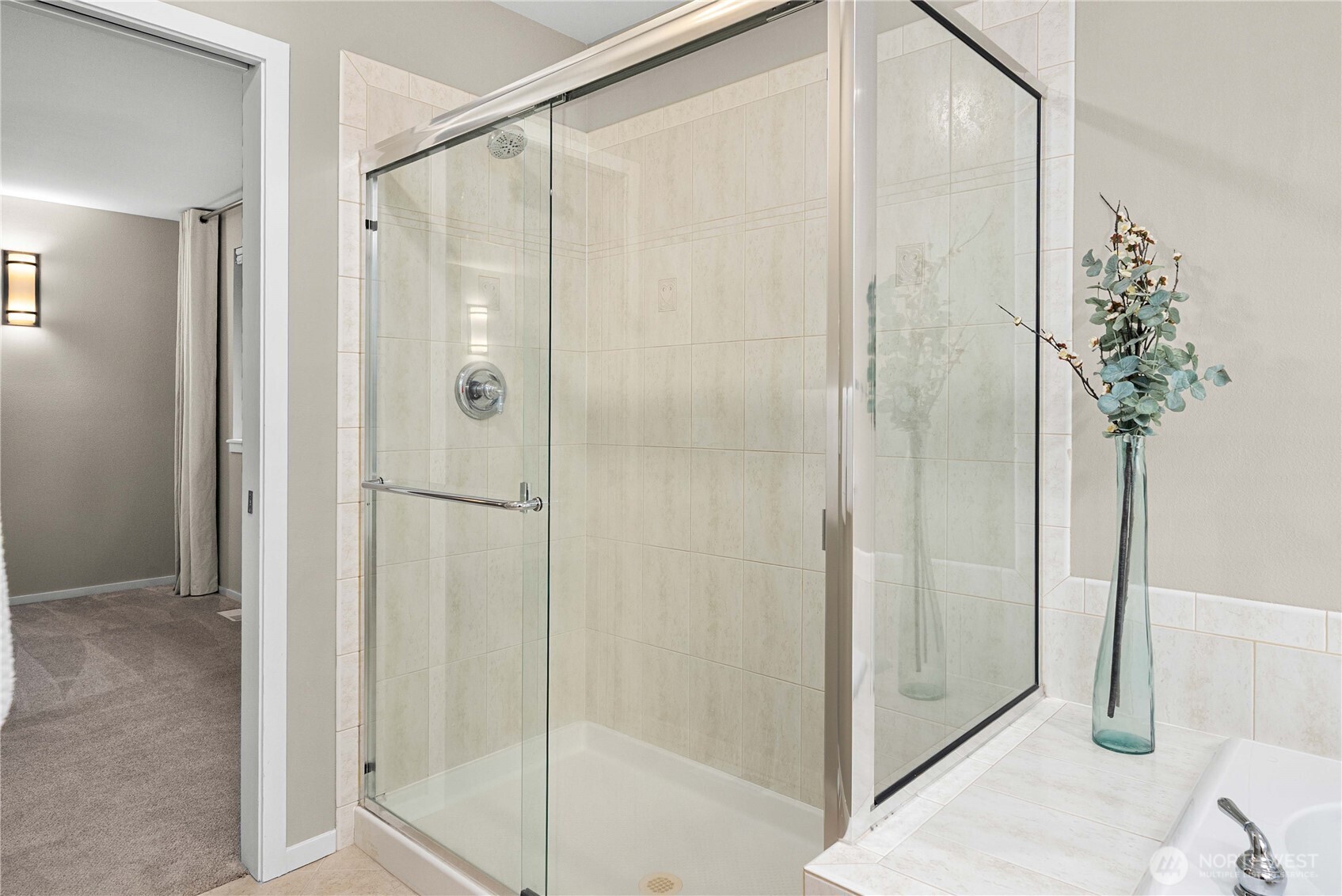 25010 235th Court Southeast Maple Valley, WA 98038 - Photo 29 of 40 a bathroom with a shower and a sink