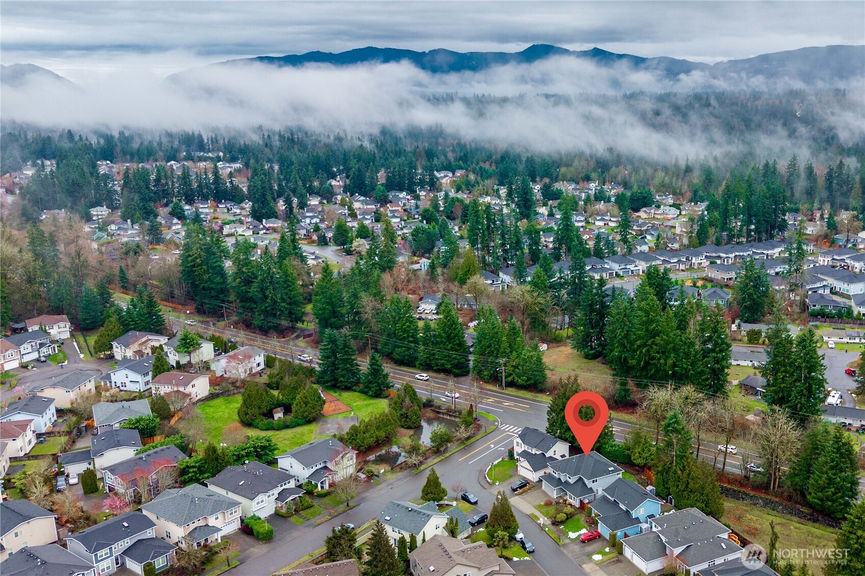 25010 235th Court Southeast Maple Valley, WA 98038 - Photo 3 of 40 a view of a lot of trees and houses