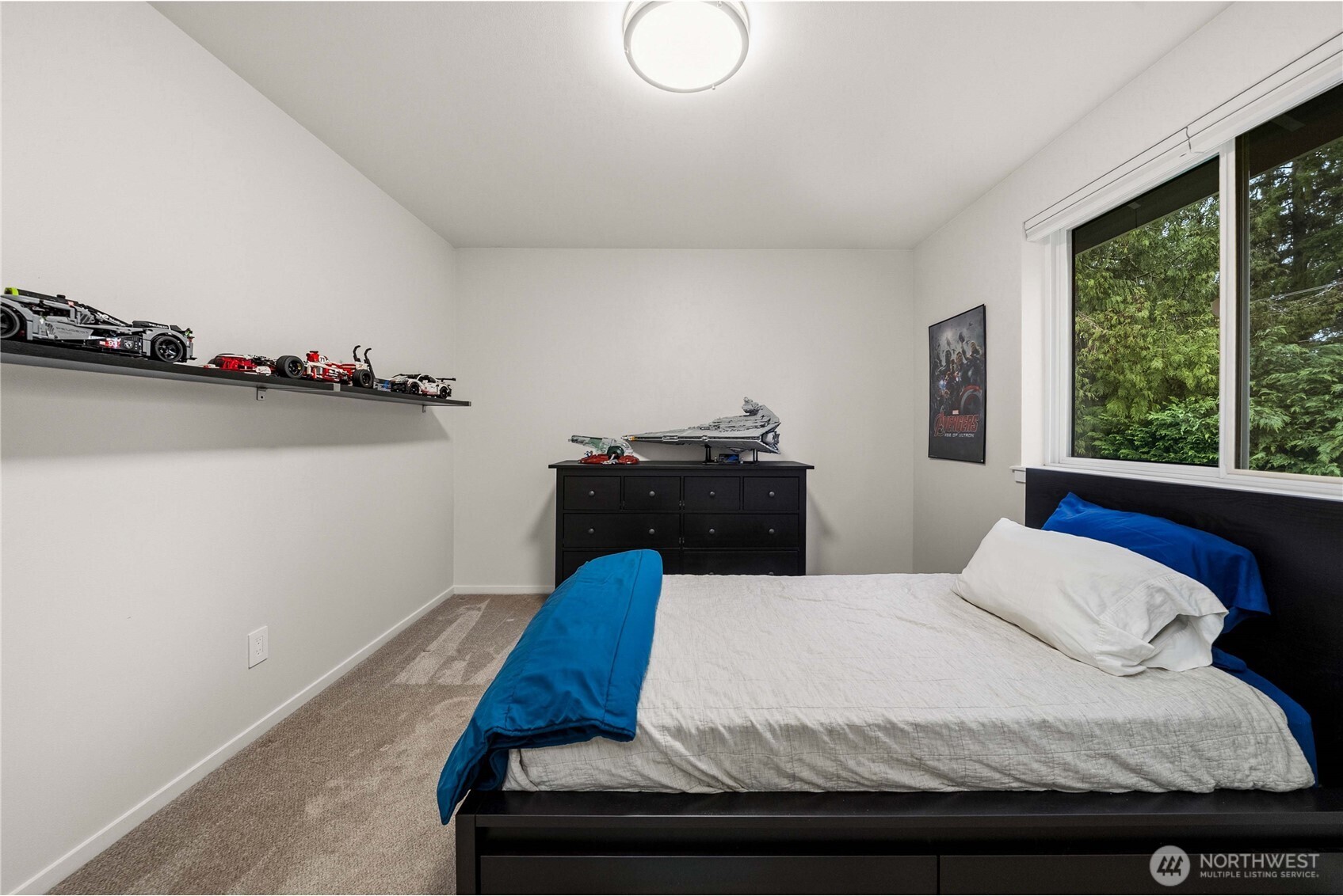 25010 235th Court Southeast Maple Valley, WA 98038 - Photo 32 of 40 a bedroom with a bed and window