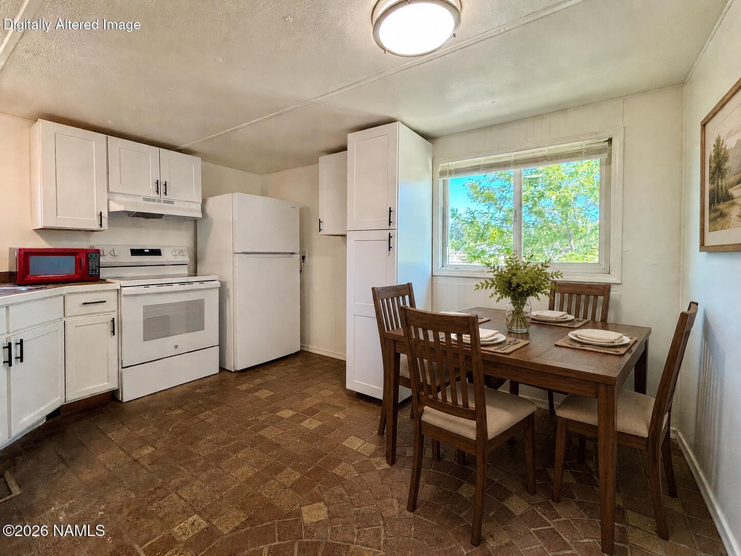 4805 South Thorn Road, Unit 1 Flagstaff, AZ 86005 - Photo 5 of 21 Open kitchen w/new appliances