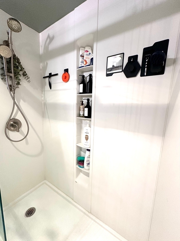 77 Adams Street, Unit 902 Quincy, MA 02169 - Photo 22 of 36 a picture of a bathroom
