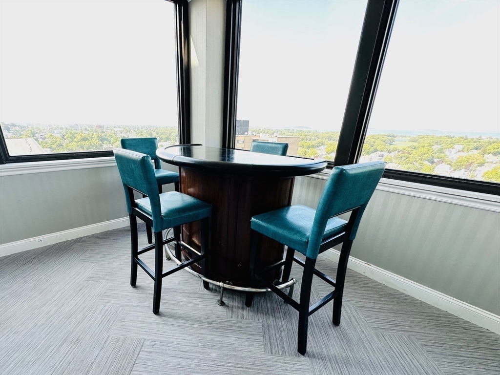 77 Adams Street, Unit 902 Quincy, MA 02169 - Photo 25 of 36 a view of a workspace with furniture and window