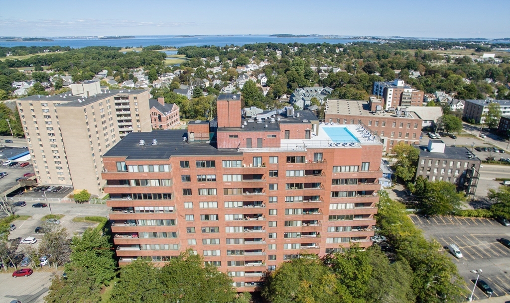 77 Adams Street, Unit 902 Quincy, MA 02169 - Photo 3 of 36 a view of a city with tall buildings