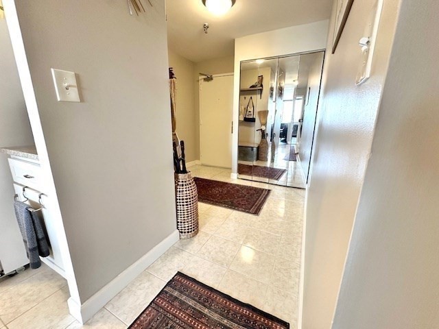 77 Adams Street, Unit 902 Quincy, MA 02169 - Photo 8 of 36 a view of a living room with a fireplace