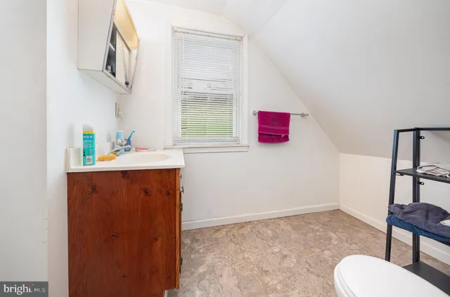 a workspace with furniture and window