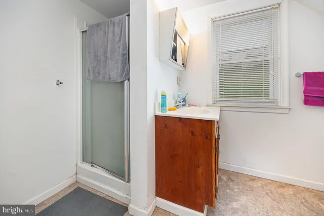a view of hallway with washer and dryer