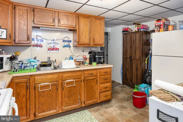a kitchen with a sink and dishwasher