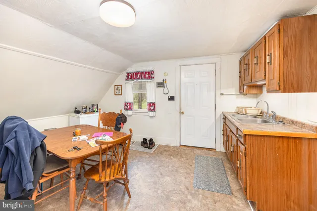 a workspace with furniture and a window