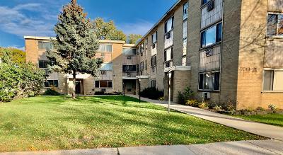 7019 North Ridge Boulevard, Unit 2C Chicago, IL 60645 - Photo 1 of 12 a view of a house with a yard