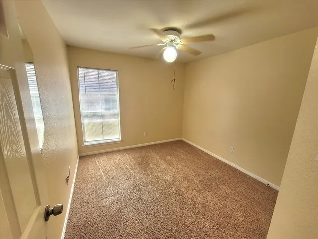 a view of empty room with window