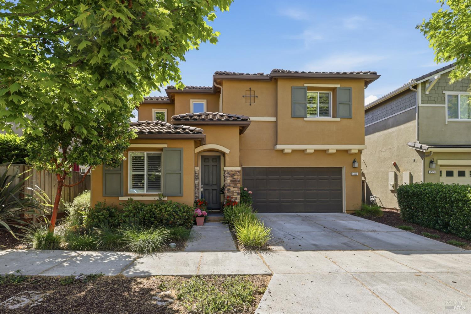 5533 Kennedy Place Rohnert Park, CA 94928 - Photo 37 of 63 a front view of a house with garden