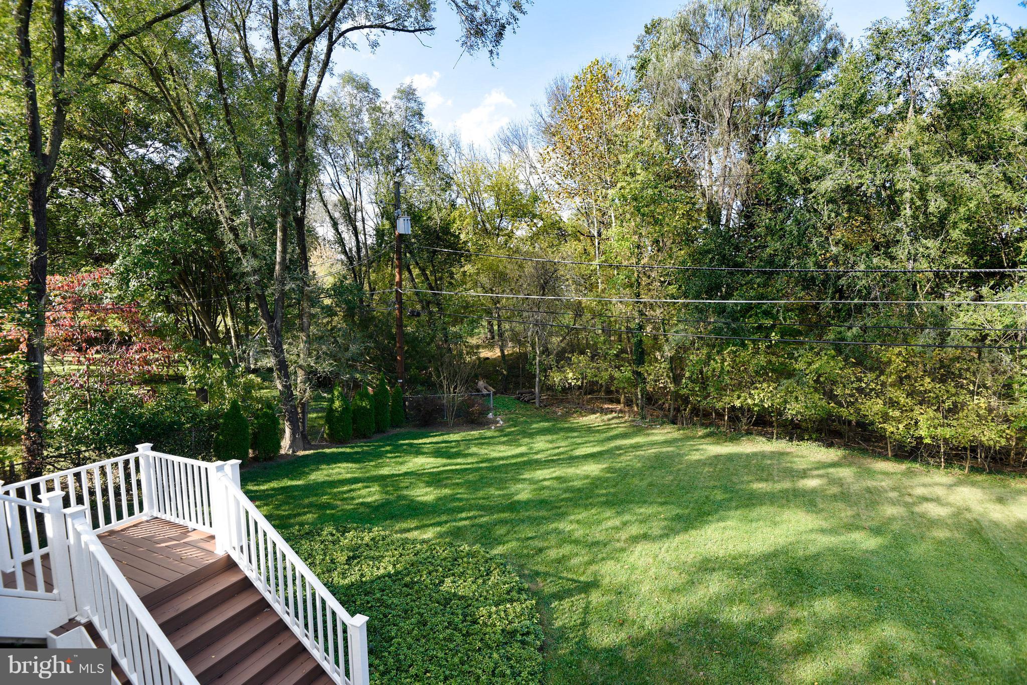 176 Cinder Road Lutherville-Timonium, MD 21093 - Photo 23 of 26 Stairs from Deck lead to Rear Yard