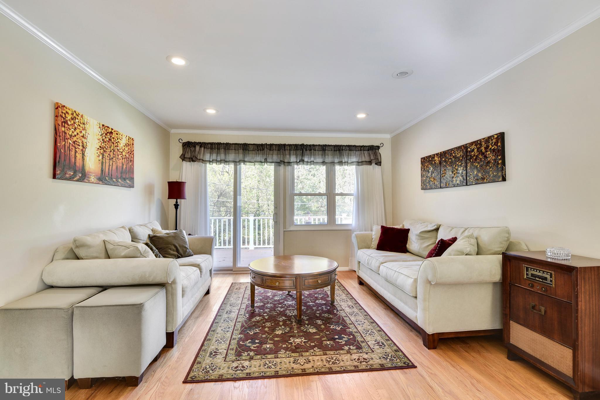 176 Cinder Road Lutherville-Timonium, MD 21093 - Photo 7 of 26 Living Room Leads to Rear Deck