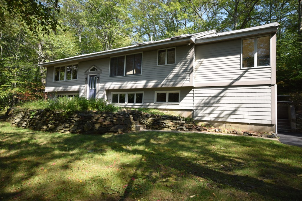 9 Ely Road Wilbraham, MA 01095 - Photo 1 of 26 a front view of a house with a yard