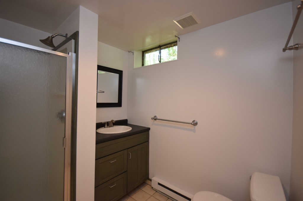 9 Ely Road Wilbraham, MA 01095 - Photo 15 of 26 a bathroom with a granite countertop sink toilet and vanity
