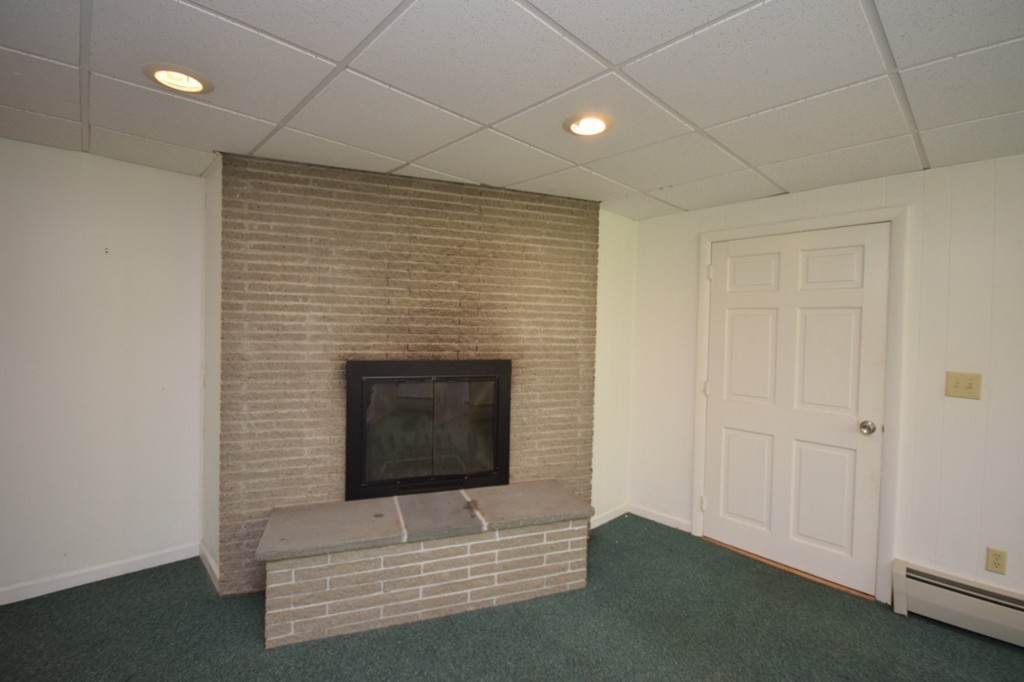 9 Ely Road Wilbraham, MA 01095 - Photo 19 of 26 a hallway with fireplace