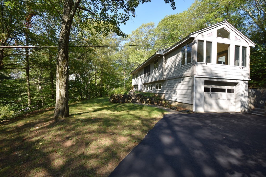 9 Ely Road Wilbraham, MA 01095 - Photo 25 of 26 a front view of a house with a yard