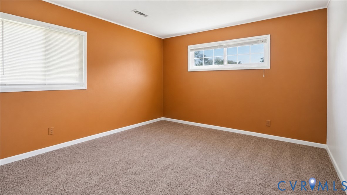 1310 Andover Road Henrico, VA 23229 - Photo 29 of 43 Room featuring orange-painted walls with white tri