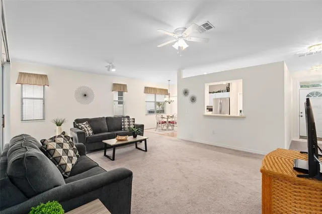 a living room with furniture and a window