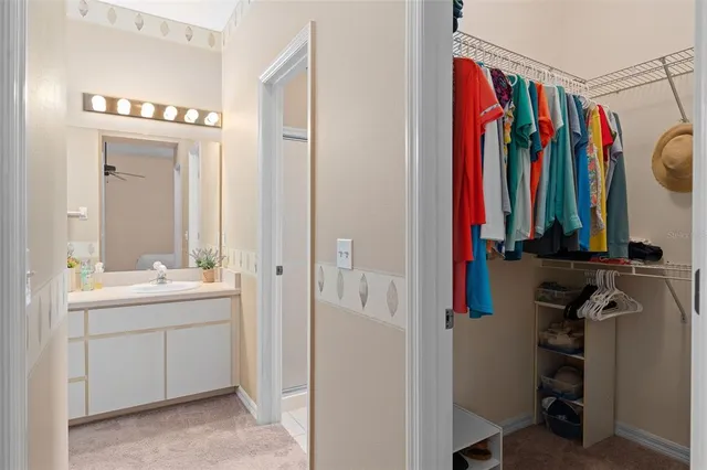 a view of a bathroom with a tub and a sink