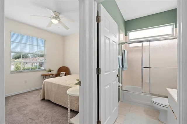 a room with a bed and a window