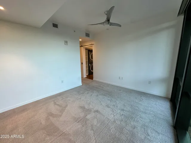 a view of a patio with table and chairs potted plants with wooden floor