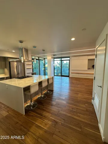 a bathroom with a shower and a toilet