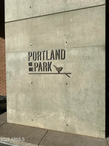 a view of an empty room with a chandelier
