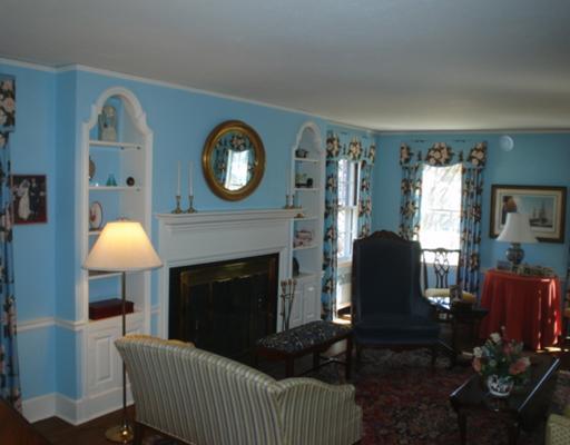 12 Perryridge Road Greenwich, CT 06830 - Photo 3 of 8 a living room with furniture and a fireplace