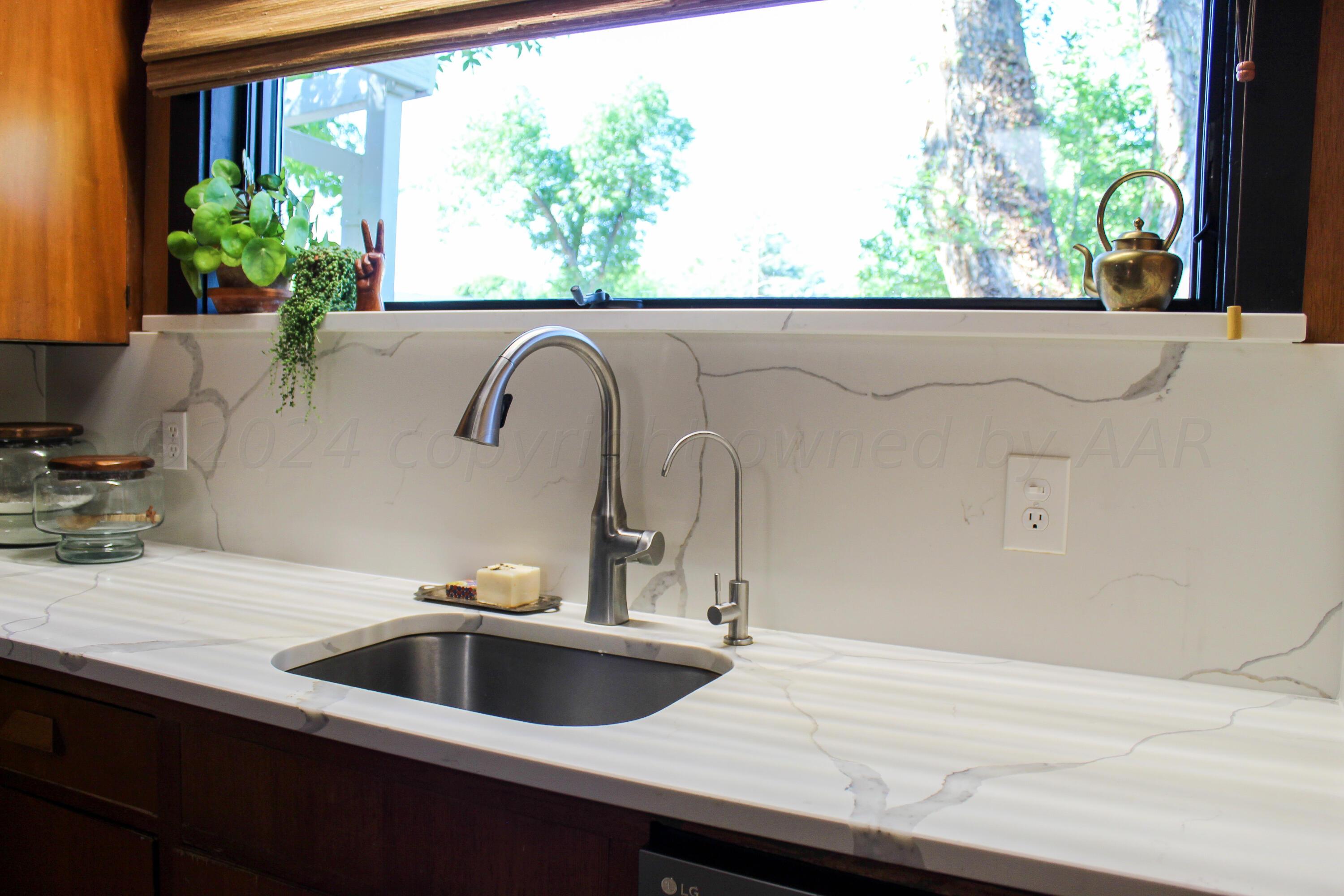 710 Park Avenue Panhandle, TX 79068 - Photo 18 of 26 a close view of sink and tap