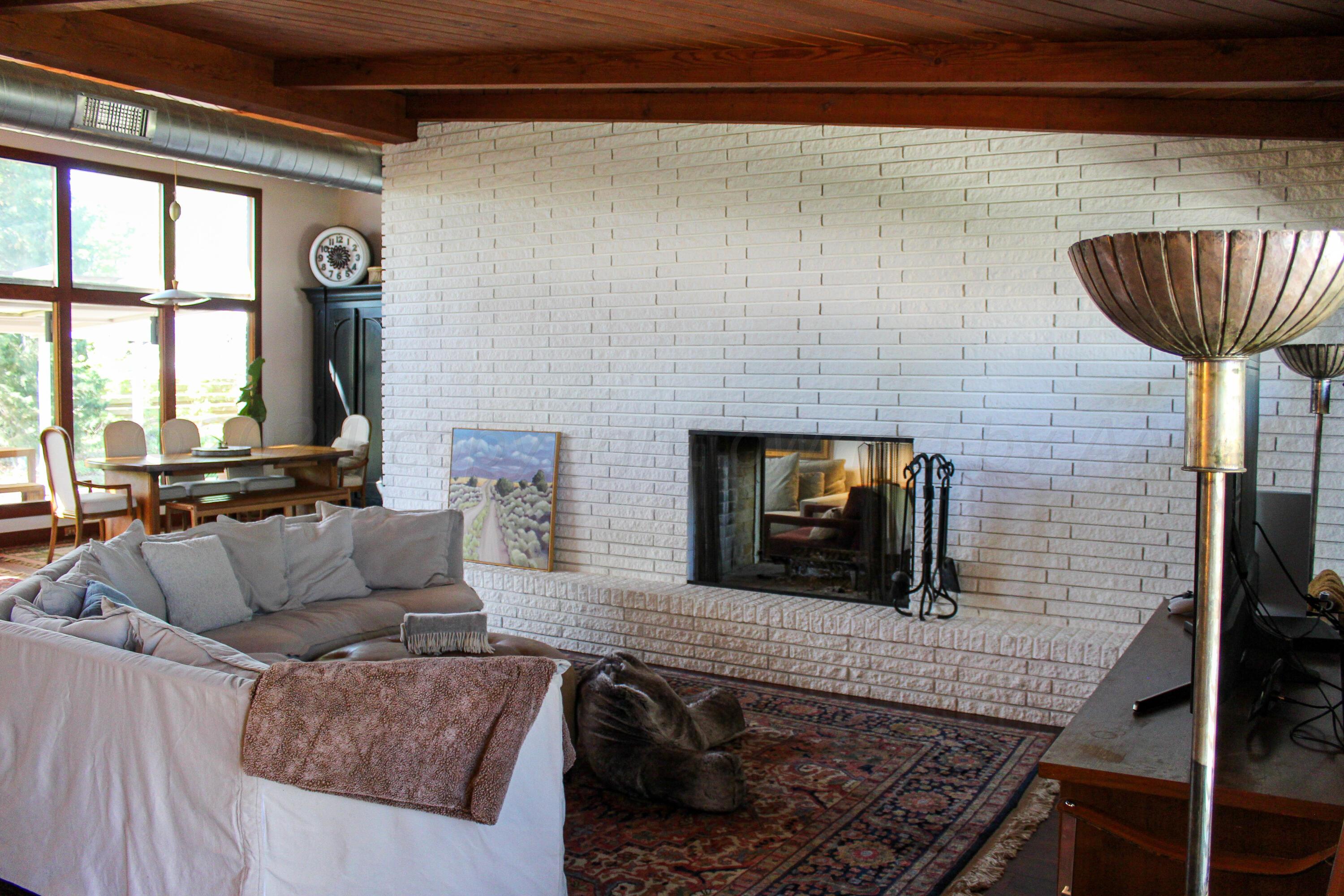 710 Park Avenue Panhandle, TX 79068 - Photo 7 of 26 a living room with furniture and a fireplace
