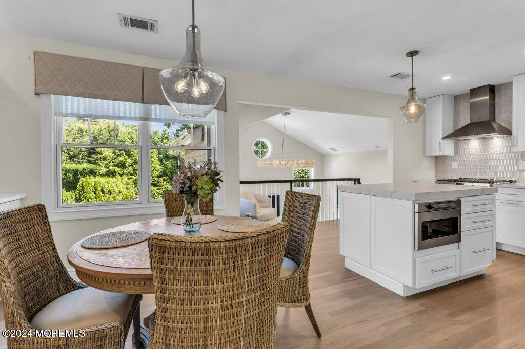 3 Ruddy Court Little Silver, NJ 07739 - Photo 16 of 55 a kitchen with kitchen island stainless steel appliances a dining table and chairs
