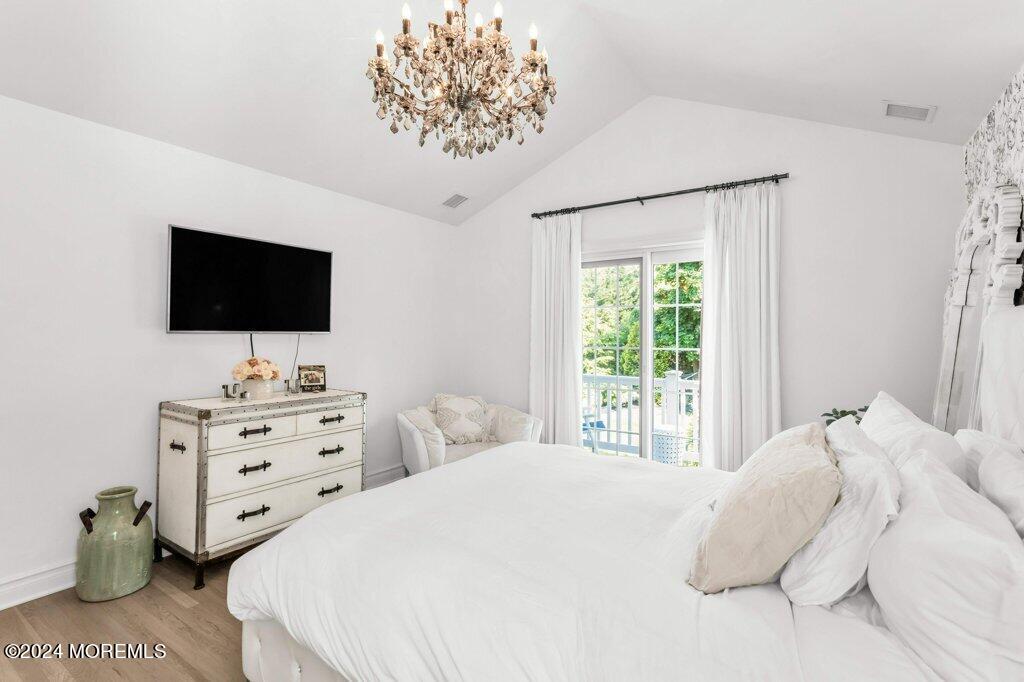 3 Ruddy Court Little Silver, NJ 07739 - Photo 18 of 55 a bedroom with a bed and a flat screen tv