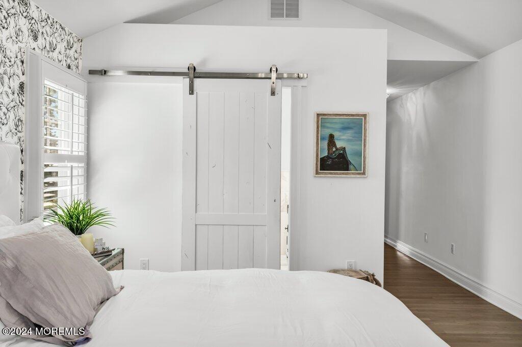 3 Ruddy Court Little Silver, NJ 07739 - Photo 20 of 55 a bedroom with a large bed and a potted plant