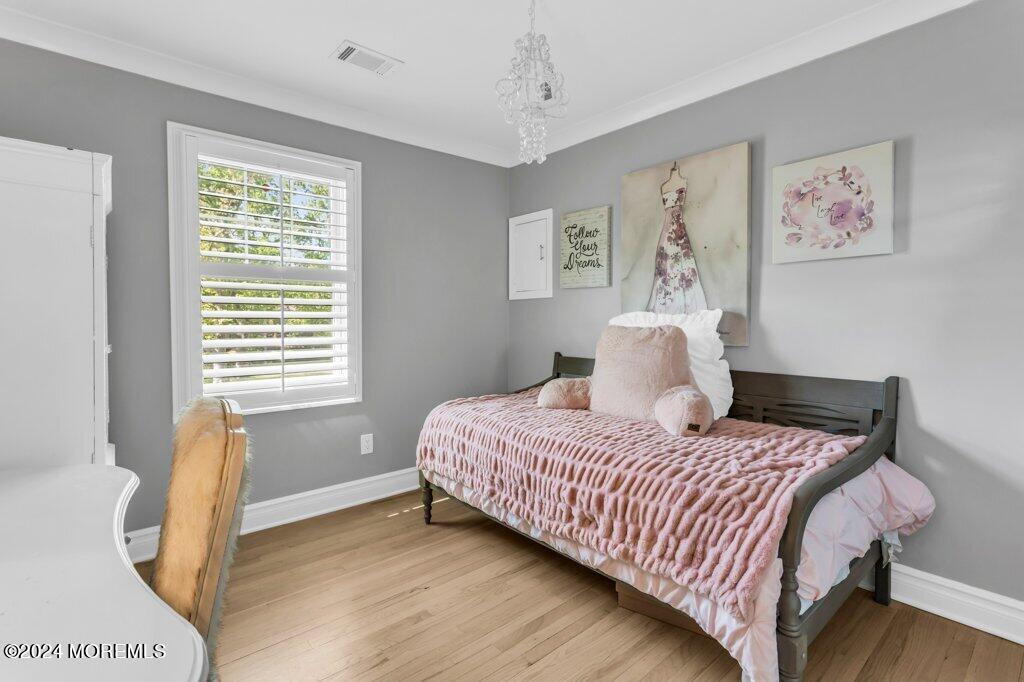 3 Ruddy Court Little Silver, NJ 07739 - Photo 27 of 55 a bedroom with a bed and wooden floor