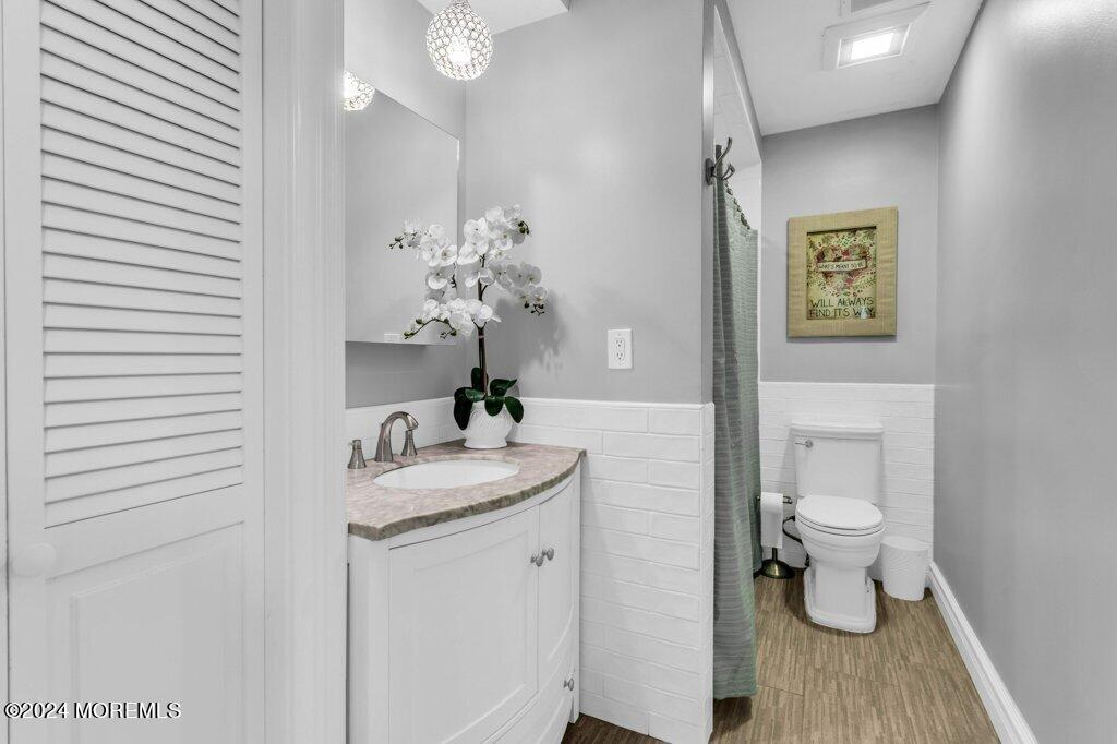 3 Ruddy Court Little Silver, NJ 07739 - Photo 28 of 55 a bathroom with a toilet sink and mirror