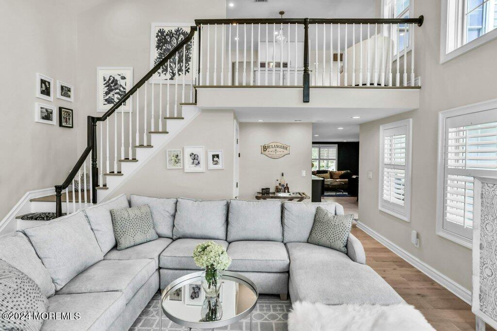 3 Ruddy Court Little Silver, NJ 07739 - Photo 43 of 55 a living room with furniture or stairs and a large window
