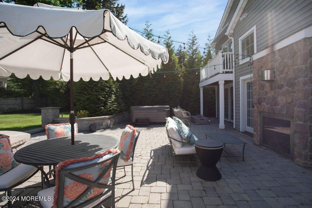 3 Ruddy Court Little Silver, NJ 07739 - Photo 49 of 55 a view of a patio with table and chairs and a barbeque