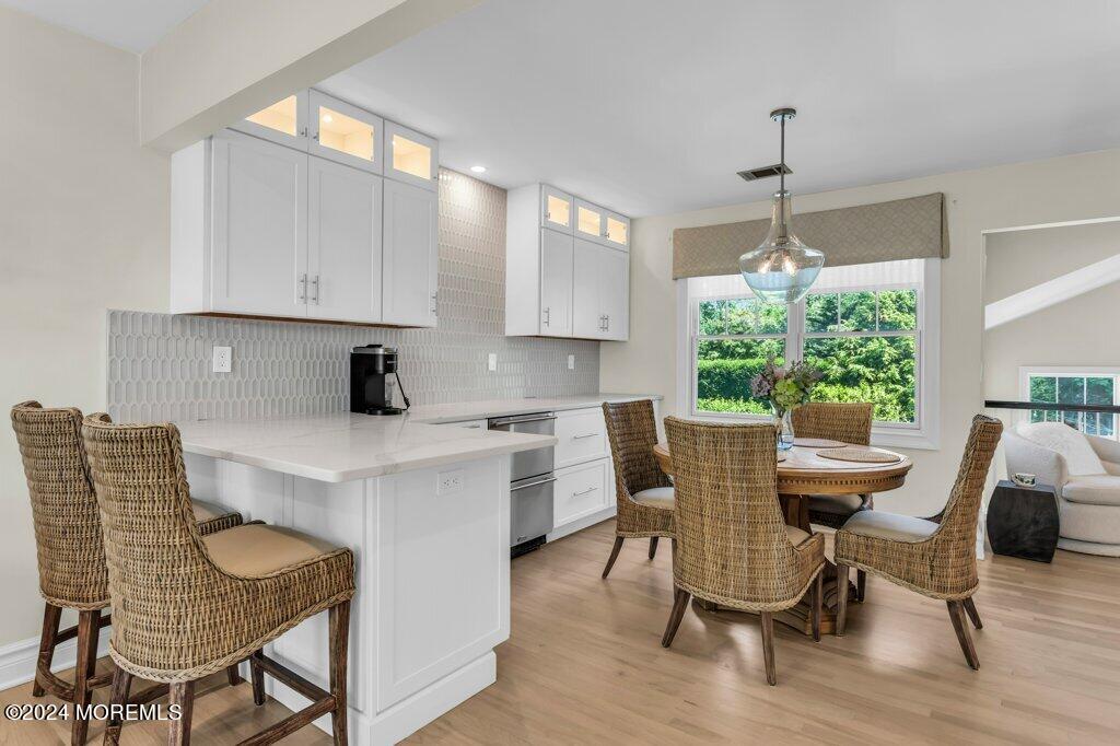 3 Ruddy Court Little Silver, NJ 07739 - Photo 5 of 55 a view of kitchen with dining table chairs and wooden floor