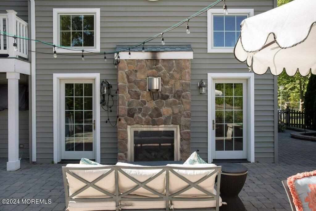 3 Ruddy Court Little Silver, NJ 07739 - Photo 51 of 55 a backyard of a house with seating space