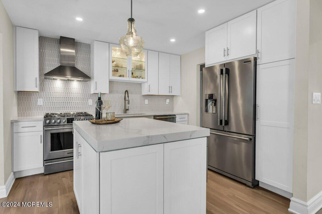 3 Ruddy Court Little Silver, NJ 07739 - Photo 7 of 55 a kitchen with stainless steel appliances a refrigerator sink and stove