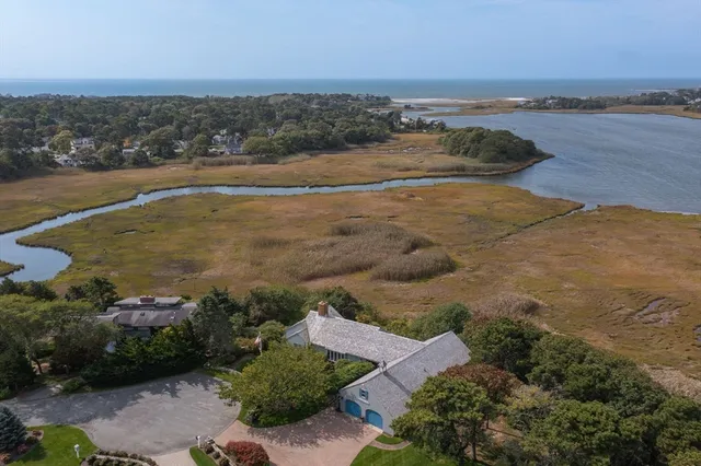 an aerial view of beach and ocean
