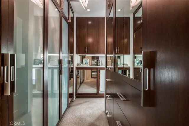 a view of a patio with table and chairs