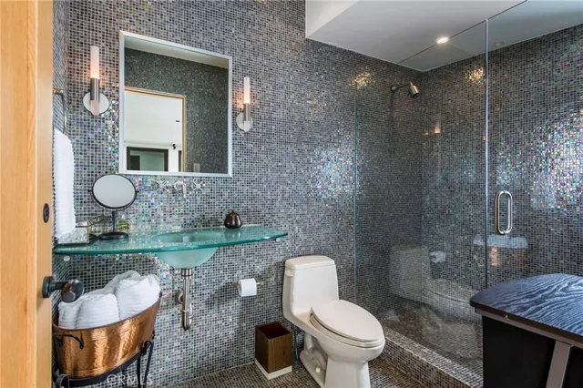 a view of a patio with couple of chairs