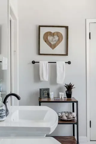 a bathroom with a bathtub and sink