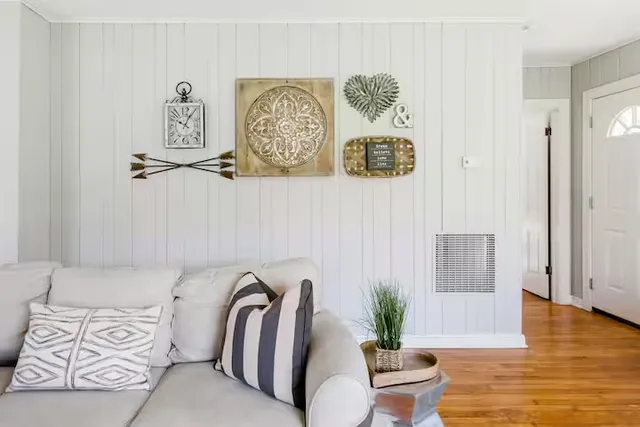 a view of front door with wooden floor